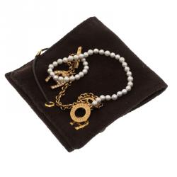 Pre Owned Aigner Faux Pearl Crystal Gold Tone Toggle Bracelet