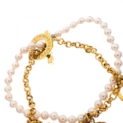 Pre Owned Aigner Crystal Logo Charm and Faux Pearl Gold Plated Layered Bracelet