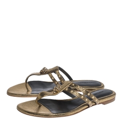 Pre Owned Alexander McQueen Metallic Gold Leather Embellished Skull Flat Thong Sandals Size 37