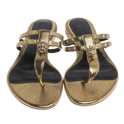 Pre Owned Alexander McQueen Metallic Gold Leather Embellished Skull Flat Thong Sandals Size 37