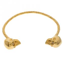 Pre Owned Alexander McQueen Twin Skull Gold Tone Open Cuff Bracelet 19cm