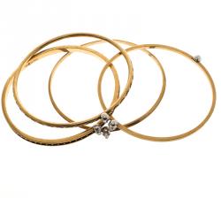 Alexander McQueen Armour Skull Gold Tone Set of 4 Bangles One Size