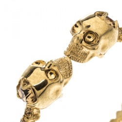 Pre Owned Alexander McQueen Twin Crystal Embedded Skull Gold Tone Cuff Bracelet