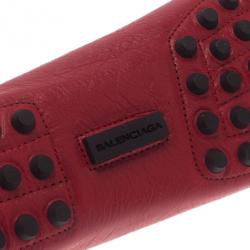 Pre Owned حذاء لوفرز بالنسيياغا آرينا بروج جلد أحمر مقاس 38.5