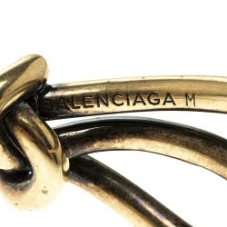 Pre Owned Balenciaga Bow Boucle Gold Tone Open Cuff Bracelet Size M