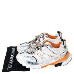مملوكة مسبقًا حذاء تراك تراينرز بالنسياغا شبك وجلد برتقالي / أبيض مقاس 38