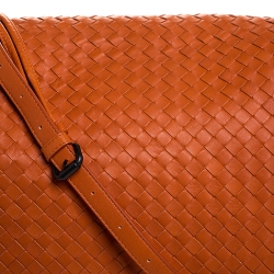 Pre Owned Bottega Veneta Orange Intrecciato Leather Drawstring Flap Crossbody Bag