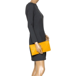 Pre Owned Bottega Veneta Yellow Intrecciato Leather Twist Lock Clutch