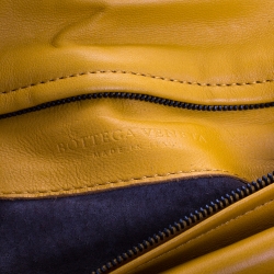 Pre Owned Bottega Veneta Yellow Intrecciato Leather Twist Lock Clutch