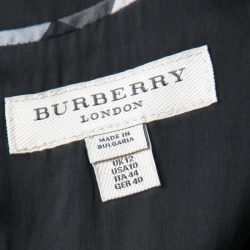 مملوكة مسبقًا فستان بربري تريكو أسود شبكة بأكمام قصيرة رقبة حرف V مقاس M