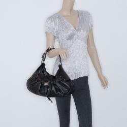 Pre Owned Burberry Metallic Leather Drawstring Warrior Hobo bag