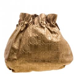 Pre Owned Carolina Herrera Gold Monogram Embossed Leather Bow Bucket Shoulder Bag