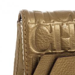 Pre Owned Carolina Herrera Gold Monogram Embossed Bow Bag