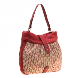 Pre Owned Carolina Herrera Red Canvas and Leather Monogram Hobo
