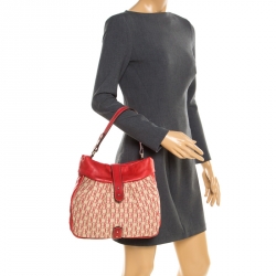 Pre Owned Carolina Herrera Red Canvas and Leather Monogram Hobo