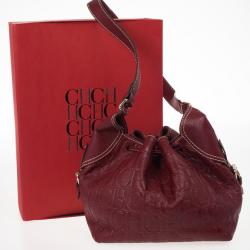 Pre Owned Carolina Herrera Embossed Drawstring Hobo