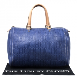 Pre Owned Carolina Herrera Purple Monorgam Embossed Leather Large Andy Boston Bag