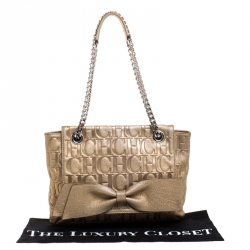 Pre Owned Carolina Herrera Gold Monogram Embossed Leather Bow Flap Shoulder Bag