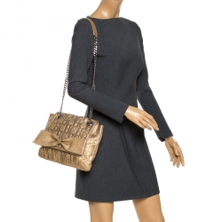 Pre Owned Carolina Herrera Gold Monogram Embossed Leather Bow Flap Shoulder Bag