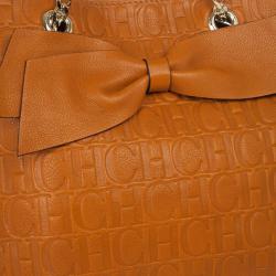 Pre Owned Carolina Herrera Orange Monogram Embossed Bow "New Anna" Tote