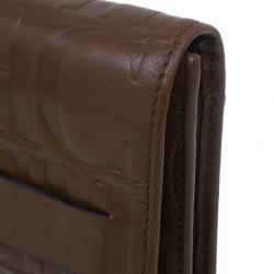 Pre Owned Carolina Herrera Brown Monogram Embossed Contential Flap Wallet