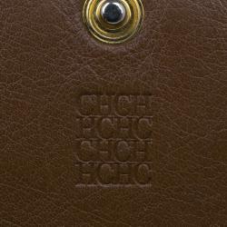 Pre Owned Carolina Herrera Brown Monogram Embossed Contential Flap Wallet