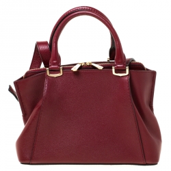 مملوكة مسبقًا حقيبة كارتييه سي دو كارتييه ميني جلد توريلون عنابي