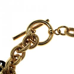 Pre Owned CH Carolina Herrera Enamel Gold Tone Button Detail Charm Toggle Bracelet & Stud Earring Set