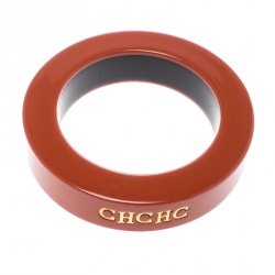 Pre Owned CH Carolina Herrera Orange Resin Gold Tone Wide Bangle Bracelet 21cm