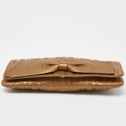 Pre Owned CH Carolina Herrera Gold Monogram Embossed Leather Bow Chain Clutch