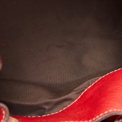 Pre Owned CH Carolina Herrera Red Monogram Embossed Leather Scarf Hobo