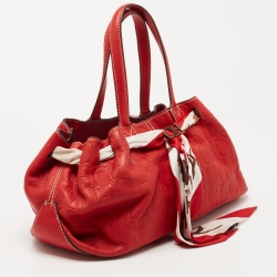 Pre Owned CH Carolina Herrera Red Monogram Embossed Leather Scarf Hobo