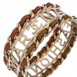 مملوكة مسبقًا Chanel Make Fashion Not War Leather Gold Tone Wide Bangle Bracelet