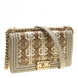 Pre Owned Chanel Biege/Gold CC Cutout Leather Medium Boy Flap Bag