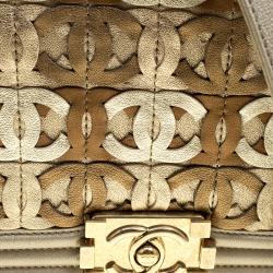 Pre Owned Chanel Biege/Gold CC Cutout Leather Medium Boy Flap Bag