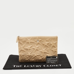 Pre Owned Chanel Gold Star Embossed Leather O Case Medium Quilted Boy Clutch Bag 