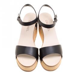 مملوكة مسبقًا صندل شانيل جلد أسود كعب روكي بحزام للكاحل نعل سميك مقاس 40