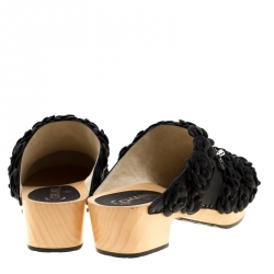 مملوكة مسبقًا حذاء مولز شانيل نعل سميك خشبي كاميليا قفل دوار CC جلد أسود مقاس 39.5