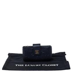 Pre Owned Chanel Metallic Navy Blue Camellia Embossed Leather Phone Pouch