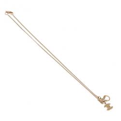 مملوكة مسبقًا قلادة شانيل فيونكة شعار GG دلاية ذهب و كريستال