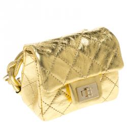 مملوكة مسبقًا حقيبة صغيرة شانيل قلاب ميني ريإيشو جلد مبطنة ميتالك ذهبية