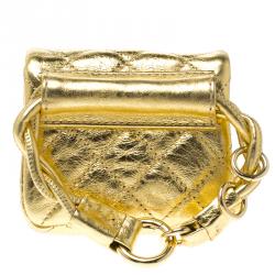 مملوكة مسبقًا حقيبة صغيرة شانيل قلاب ميني ريإيشو جلد مبطنة ميتالك ذهبية