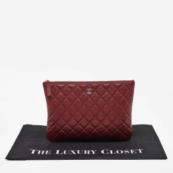 Pre Owned Chanel Red Quilted Caviar Leather Medium O-Case Zip Pouch