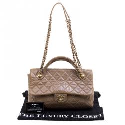 Pre Owned Chanel Beige Quilted Glazed Leather Medium Castle Rock Top Handle Bag