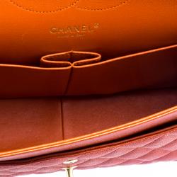 مملوكة مسبقًا حقيبة شانيل قلاب مزدوج كلاسيك جامبو جلد كافيار مبطنة لامعة برتقالية حمراء