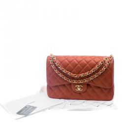 مملوكة مسبقًا حقيبة شانيل قلاب مزدوج كلاسيك جامبو جلد كافيار مبطنة لامعة برتقالية حمراء
