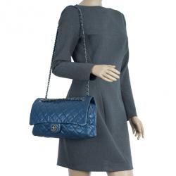 Pre Owned Chanel Metallic Blue Caviar Leather Medium Flap Bag