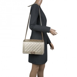 Pre Owned Chanel Light Gold Perforated Leather New Medium Boy Bag