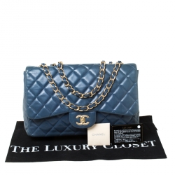 مملوكة مسبقًا حقيبة شانيل قلاب كلاسيك جامبو جلد لامع مبطنة كحلية