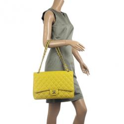 Pre Owned Chanel Yellow Caviar Classic Maxi Flap Bag